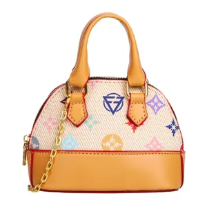 Sac à main arrondi à motif multicolore, anses camel et bandoulière en chaîne dorée