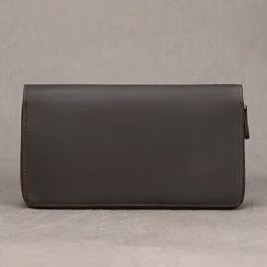 Front view of a dark brown leather wallet laid flat, showing fine grain and neat edge stitching
