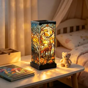 Warm bedside scene with a glowing stained-glass panel depicting a deer, roses, and woodland trees