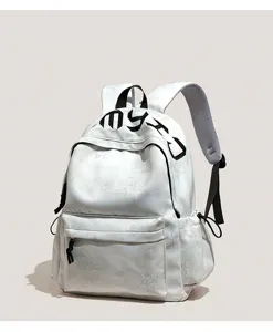 Sac à dos blanc avec motif étoilé en relief, lettrage noir, poche avant zippée et détails à cordon