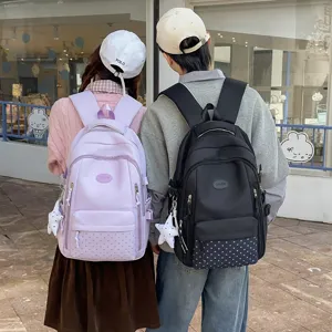 Sac à Dos Scolaire Style Japonais pour Femmes Grande Capacité Léger Nylon Étoile Imprimé Sac à Dos Décontracté Étudiants Avec Pendentif