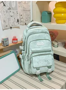 Sac à dos vert pâle avec poches zippées superposées, boucles blanches et motif étoilé discret