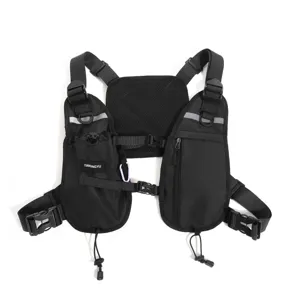 Black tactical chest pack with adjustable straps, quick-release buckles and multiple zip pockets