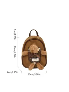 Front view of a brown plush backpack with a teddy bear charm, leather trim and size markings
