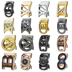 Set di 16 fibbie automatiche in metallo per cintura, finiture varie e design traforati a lettere