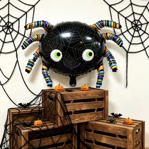 Glossy black spider balloon with web details and colorful striped legs in a Halloween scene