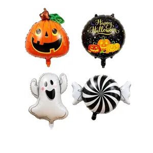 Four Halloween foil balloons: pumpkin, greeting round, ghost and black-and-white swirl candy