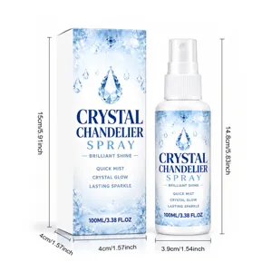 Front view of a 100 ml spray bottle beside a blue-and-white box decorated with crystal motifs