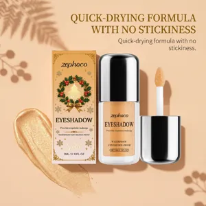 Goldener Flüssiglidschatten mit festlicher Kranzbox, silbernem Applikator und schimmerndem Swatch