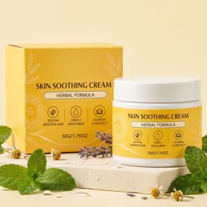 Yellow carton and white cream jar displayed with mint, lavender, chamomile and water drops