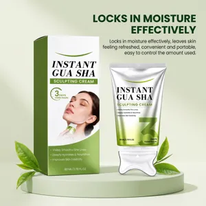 Green skincare tube and box with a white sculpting applicator displayed on a leafy platform