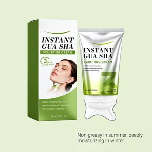 Skincare box and tube with a sculpting massage head displayed against a pale green background