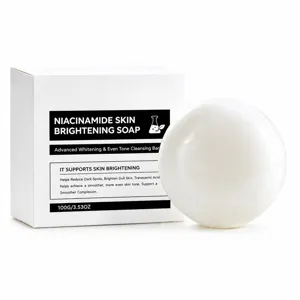 Niacinamide brightening cleansing soap, 100 g, shown as a white round bar beside its product box