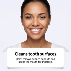 Smiling woman beside text about cleaning tooth surfaces, removing deposits and fresh breath.