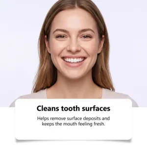 Smiling woman showing bright teeth beside text about cleaning tooth surfaces and fresh breath