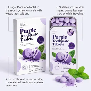 Open metal tin of purple tablets beside its box, with loose tablets and fresh mint leaves.