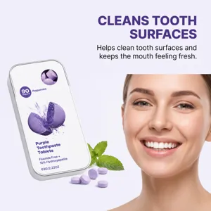Purple peppermint cleaning tablets in a metal tin, pictured with mint leaves and a smiling woman.