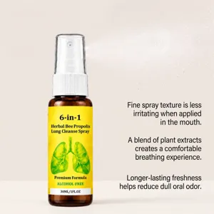 Amber glass spray bottle with a white pump and yellow label, shown beside fine spray droplets