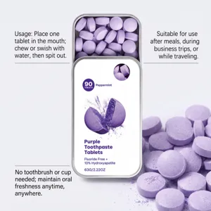Open metal tin displaying purple toothpaste tablets beside the printed peppermint product label