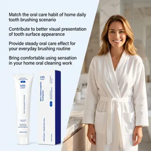 Mint toothpaste tube and box shown beside a smiling woman in a bright, modern bathroom