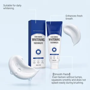 Blue-and-white toothpaste box and tube displayed with mint paste swirls on a pale blue background