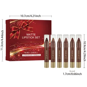 Six matte lipstick tubes beside a red gift box with gold ribbon and printed size labels