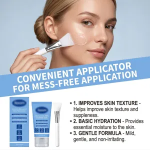 Woman applying a clear facial mask with a white brush, with blue product packaging below