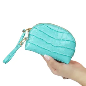 Tiffany blue leather coin purse with crocodile embossing, gold zipper and detachable wrist strap