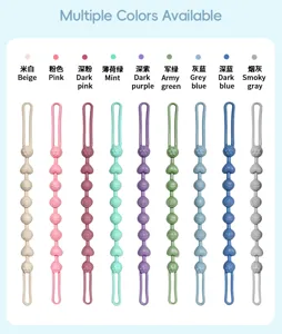 Nine silicone pacifier clips in assorted colors, arranged vertically on a pale background