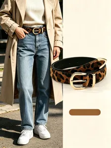 Leopard-print belt with gold-tone buckle beside a casual outfit, showing its plush texture