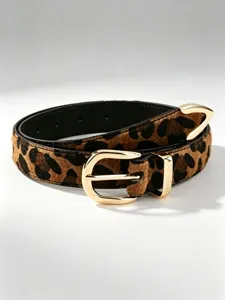 Close-up of the belt's brown leopard-print texture, black lining, and polished gold-tone buckle.