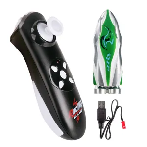 Green and silver mini remote-control speedboat set with handheld controller and USB charging cable