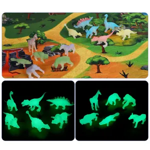 Leuchtende Dinosaurier- und Tierfiguren auf einer Spielmatte, im Dunkeln deutlich sichtbar