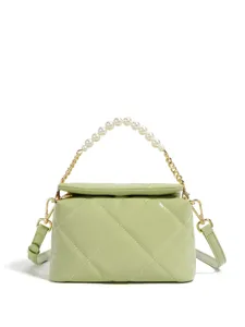 Green quilted faux leather handbag with pearl-and-gold chain handle and detachable shoulder strap