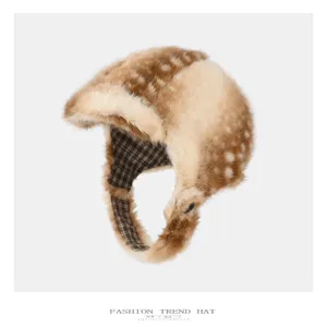 Flat-lay view of tan plush fabric with a faux deer pattern, fluffy ear flaps and brown plaid lining