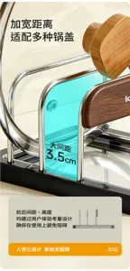 Close-up of 3.5 cm gaps between polished steel lid dividers, with lids in a black base