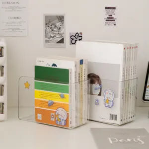 Two clear acrylic desktop book organizers holding books, decorated with playful cartoon stickers
