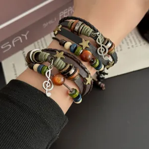 Bracelet Punk Tissé en Cuir PU Style Ethnique Rétro pour Hommes Femmes Breloque Note de Musique Étoile Multicouche Bijoux de Main Bohème Cadeau