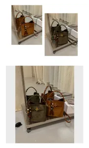 Two olive green and brown bags with matte suede-like texture, braided handles and wooden bead charms