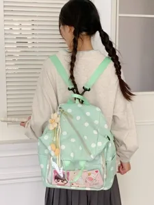 Sac à dos vert menthe à pois blancs, avec poche avant transparente et breloques mignonnes