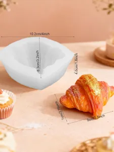 White silicone mold shown with measurements: 10.2 cm wide, 8.3 cm high and 4.6 cm deep