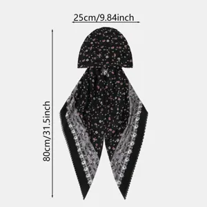 Fascia nera a fiori distesa, con bordi in pizzo e misure indicate di 25 × 80 cm