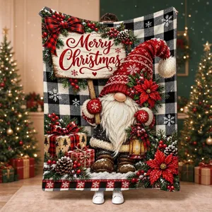 View of a Christmas gnome print, Merry Christmas lettering, and black-and-white plaid blanket