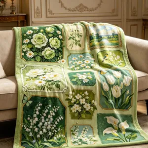 Couverture en flanelle verte à motifs floraux vintage, drapée sur un canapé beige
