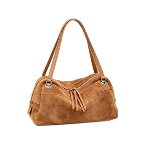 Brown faux suede Boston handbag with shoulder strap, silver-tone hardware, shown on a white background