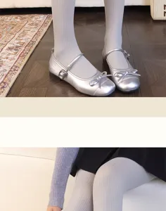 Close-up of pale ribbed tights paired with silver bow Mary Jane shoes in standing and seated views