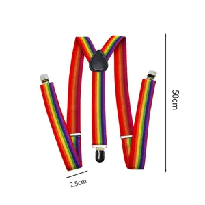 Flat-lay detail of rainbow-striped Y-shaped straps with metal clips and a black leather connector