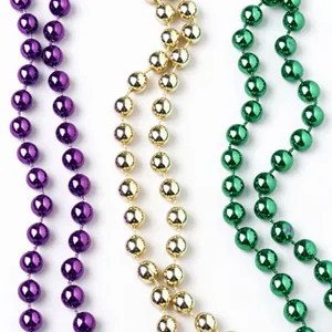 Three carnival bead necklaces in glossy purple, gold, and green, displayed vertically on white