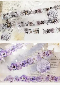 Close-up of purple and gray floral tape with butterflies and stars on a vintage paper background