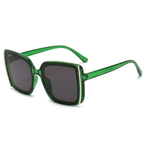 Large square sunglasses with translucent green plastic frames and dark gray lenses, shown at an angle